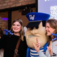 Louie anchors up with a group of grads